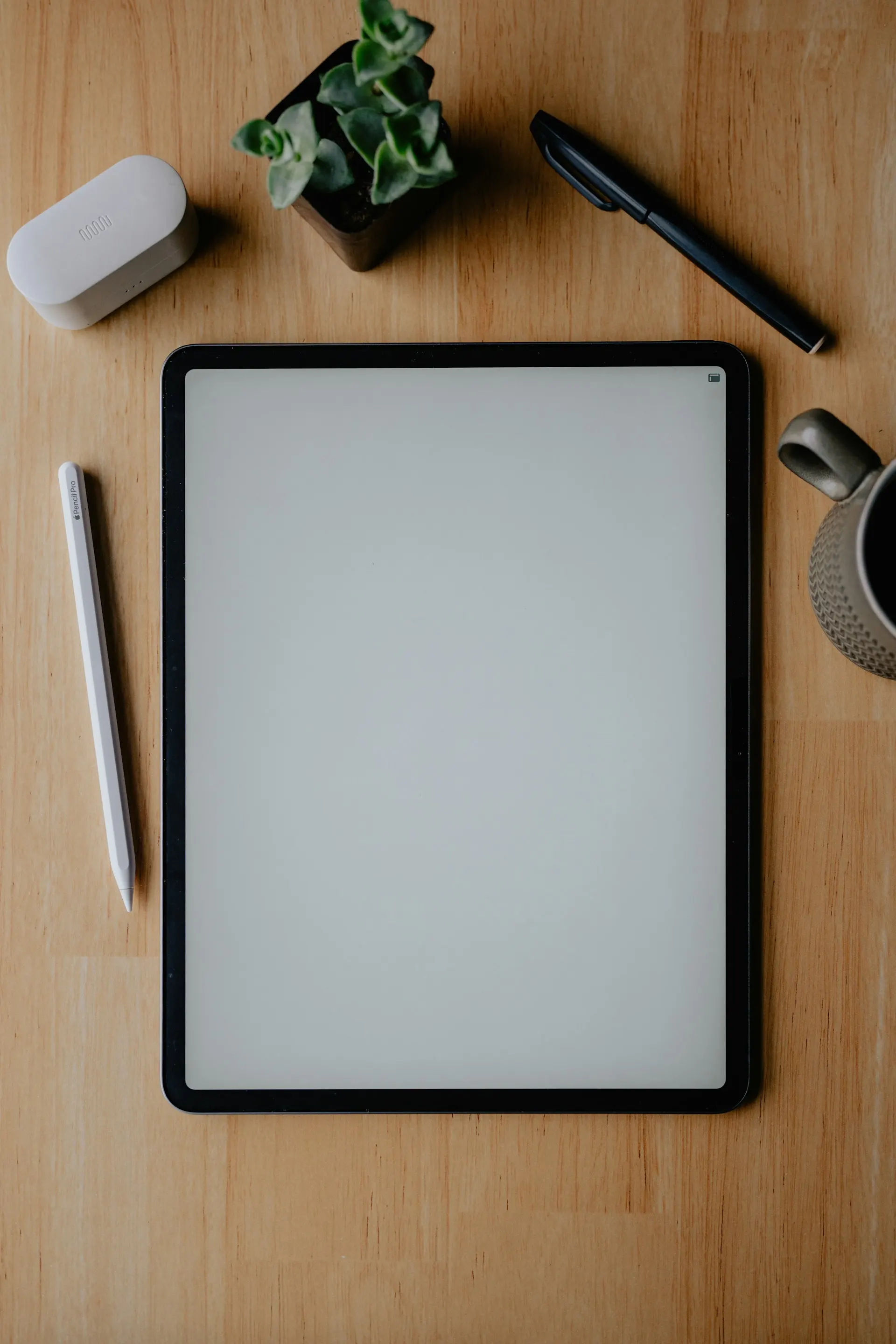 Espacio de trabajo de Sande Studio con iPad y Apple Pencil